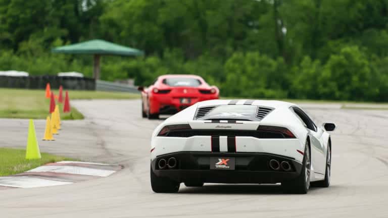 Lamborghini Huracan and a Ferrari 458 Italia on a racetrack