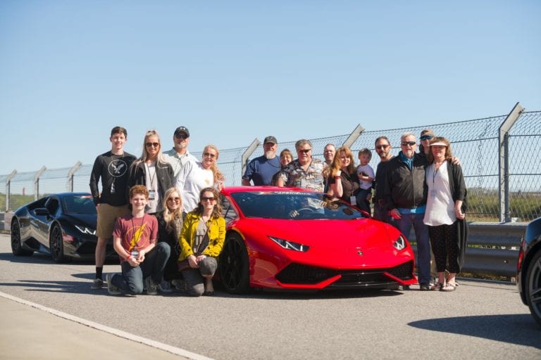 people areound race car