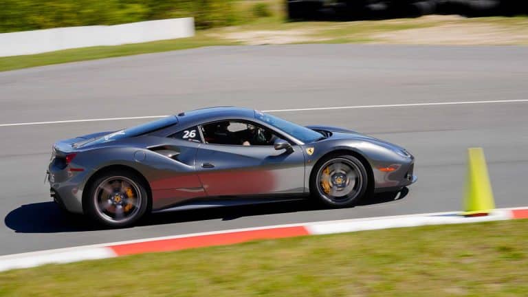 Silver Ferrari Side Profile On Track